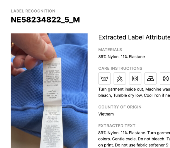 A care label photographed beside the material, care and origin attributes read from it